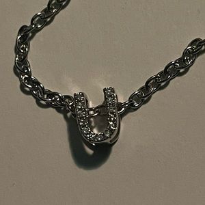 Silver chain with letter:U charm